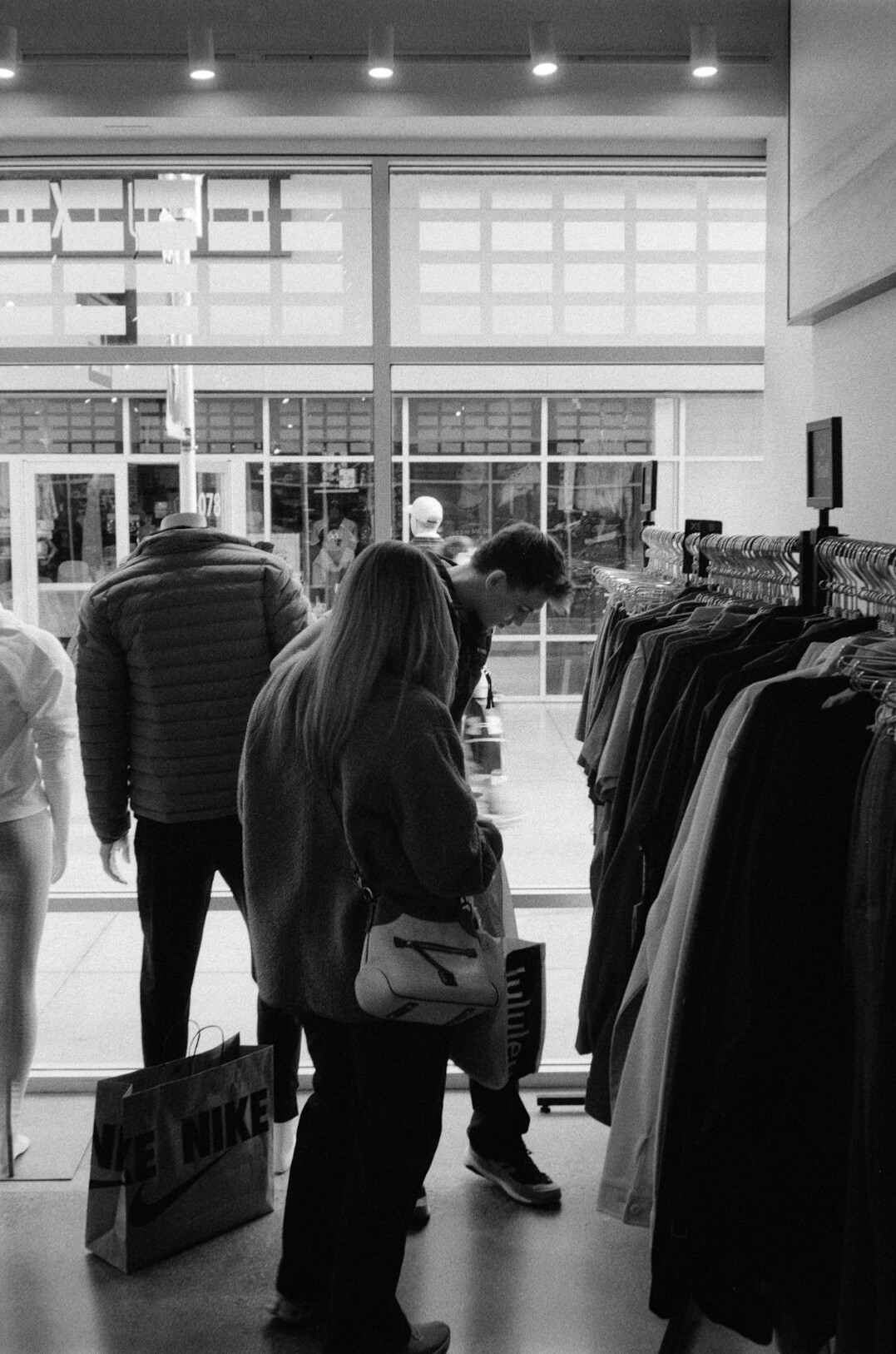 store detective observing shoppers
